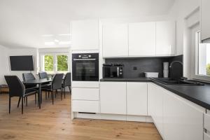 Kuchyň nebo kuchyňský kout v ubytování Luxury apartments Lotus&Lovor