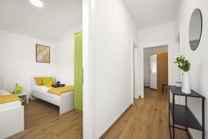 Postel nebo postele na pokoji v ubytování Luxury apartments Lotus&Lovor