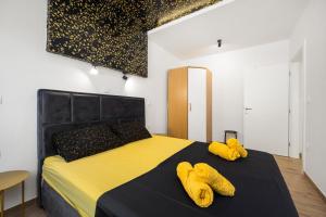 Postel nebo postele na pokoji v ubytování Luxury apartments Lotus&Lovor