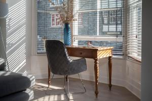 Et opholdsområde på Redbanks Apartment