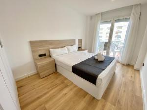 Posteľ alebo postele v izbe v ubytovaní For a Stay Regueral Mar