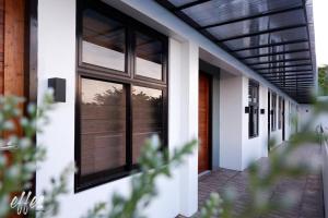 a building with glass windows and a door at 1 bedroom Apartment (Industrial Loft) in Angeles