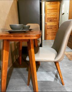 a wooden table with a bowl on top of it at 1 bedroom Apartment (Industrial Loft) in Angeles