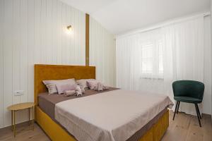 Postel nebo postele na pokoji v ubytování Luxury apartments Lotus&Lovor
