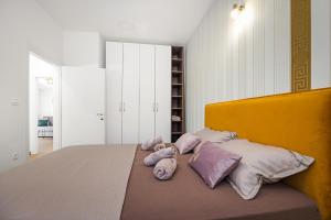 Postel nebo postele na pokoji v ubytování Luxury apartments Lotus&Lovor