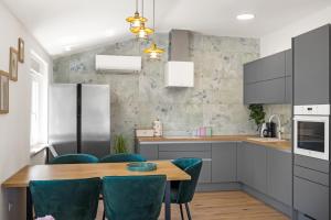 Kuchyň nebo kuchyňský kout v ubytování Luxury apartments Lotus&Lovor