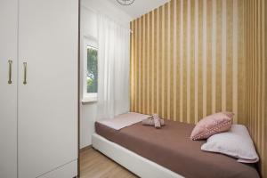 Postel nebo postele na pokoji v ubytování Luxury apartments Lotus&Lovor