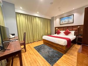 Postel nebo postele na pokoji v ubytování NUMINOUS HOTEL + 37 fotografií