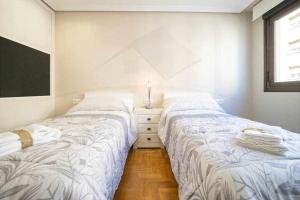 A bed or beds in a room at El Cuquiellu