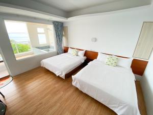 Letto o letti in una camera di 南鴻雅築South Home