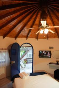 a bedroom with a blue bed and a ceiling at ForYou OtuzBeş in Izmir