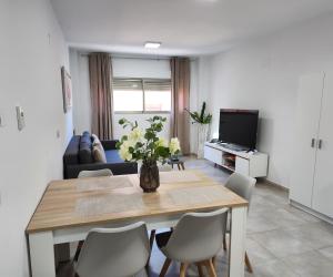 TV a/nebo společenská místnost v ubytování Magnifico apartamento cerca del centro con A.A. - CID 2