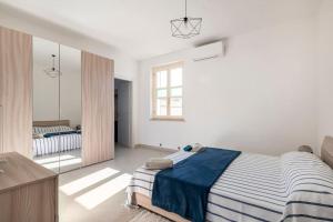 Postel nebo postele na pokoji v ubytování A Casa di Gi