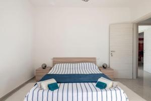 Postel nebo postele na pokoji v ubytování A Casa di Gi