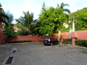 Зображення з фотогалереї помешкання Tropical Court Hotel у Монтего-Бей