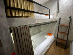Postel nebo postele na pokoji v ubytování DUDU'S HOSTEL