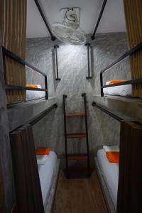 Postel nebo postele na pokoji v ubytování DUDU'S HOSTEL