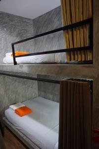Postel nebo postele na pokoji v ubytování DUDU'S HOSTEL