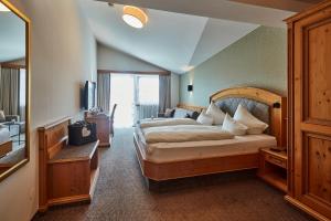 Posteľ alebo postele v izbe v ubytovaní Hotel Gabi