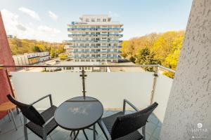 Balkón nebo terasa v ubytování Jantar Apartamenty - Promenada Kołobrzeg