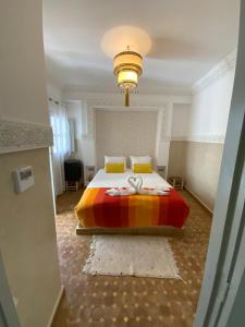 Postel nebo postele na pokoji v ubytování Riad magnolia privé