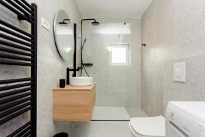 a bathroom with a shower and a sink and a toilet at HOUSE GAZO in Trogir +28 photos