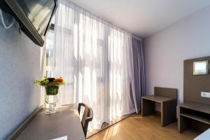 TV a/nebo společenská místnost v ubytování Hotel Montesol Benidorm