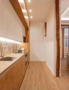 a kitchen with a sink and a counter top at Luxury flat Centro I in Madrid