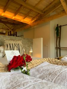 Cama ou camas em um quarto em Villa Margaridi