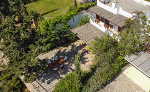 an overhead view of a house with a backyard at Grand Bleu Porto Heli - Beachfront House, Agios Emilianos in Porto Heli