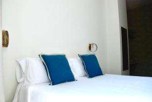 Cama o camas de una habitación en La Casa de la Alameda