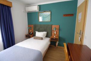 Una cama o camas en una habitación de WOT Ericeira