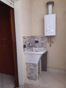 Kúpeľňa v ubytovaní jacaranda