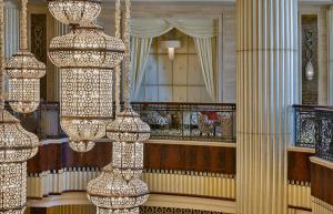 a group of chandeliers are hanging in a room at The St. Regis Abu Dhabi in Abu Dhabi +233 photos