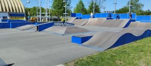 a skateboard ramp in a skate park with people on it at Ubytování na námořní jachtě in Veselí nad Moravou