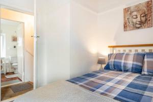 Llit o llits en una habitació de Close to city centre home