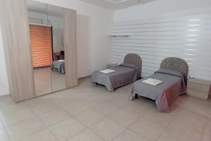 A bed or beds in a room at B&B Da Luca