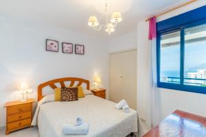 Postel nebo postele na pokoji v ubytování Apartamento Turquesa Beach 310B - Grupo Turis