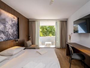 Postel nebo postele na pokoji v ubytování Hotel Villa Rosetta + 37 fotografií