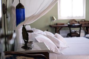 A bed or beds in a room at Villa Mavrianos