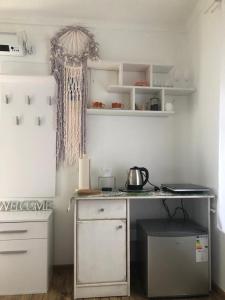 Kuchyň nebo kuchyňský kout v ubytování Przytulny apartament dla dwojga
