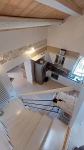 Kuchyň nebo kuchyňský kout v ubytování La Lupinella Apartment