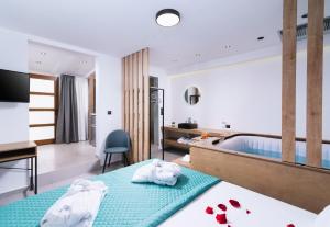 Posteľ alebo postele v izbe v ubytovaní Alcyone Studios and Apartments