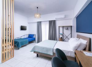 Posteľ alebo postele v izbe v ubytovaní Alcyone Studios and Apartments