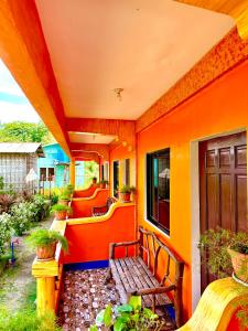 Posezení v ubytování Edem Tourist Inn Malapascua