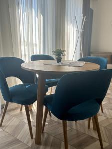 Posedenie v ubytovaní BUNASTA Apartments