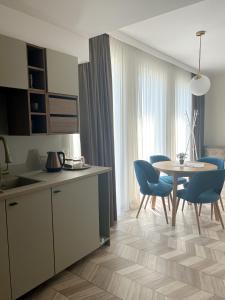Kuchyňa alebo kuchynka v ubytovaní BUNASTA Apartments