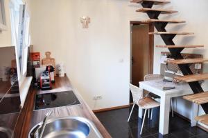 a kitchen with a sink and a wooden counter top at Lavender cozy & lovely 17 in Split