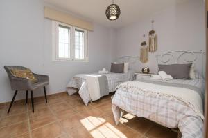 Un pat sau paturi într-o cameră la Rincon de los Deseos