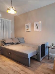 a bedroom with a large bed in a room at Semeli The 3As Armonia, Ariadne, Artemis in Paphos City +35 photos